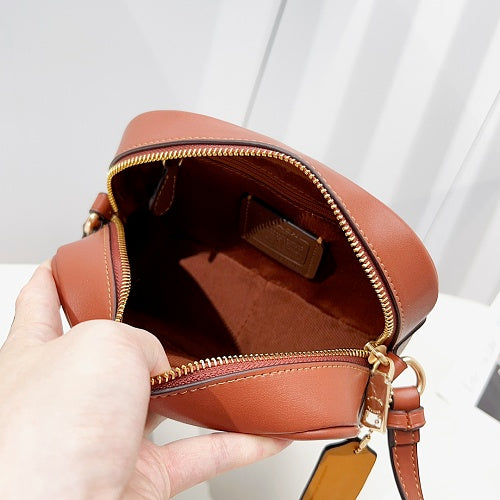 Coach x Peanuts Snoopy Signature Camera Bag