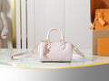 Louis Vuitton Nano Speedy / Mini Speedy-style bagLouis Vuitton Nano Speedy / Mini Speedy-style bag