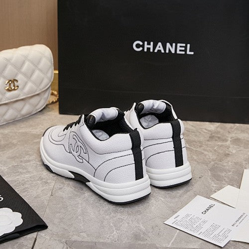 Chanel White & Black CC Logo Low-Top Sneakers
