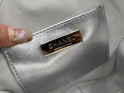Chanel Silver Metallic Quilted Star-Shaped Chain Bag.