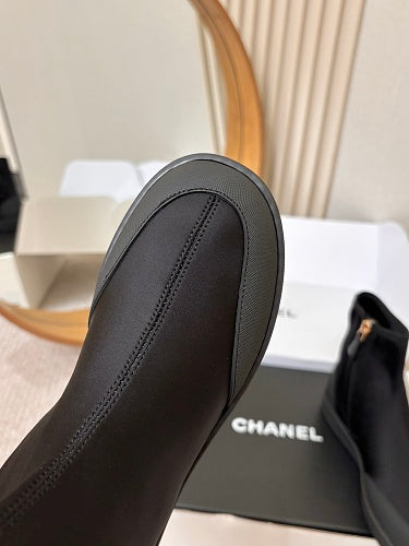 Chanel CC Logo Sock Ankle Boots in Black