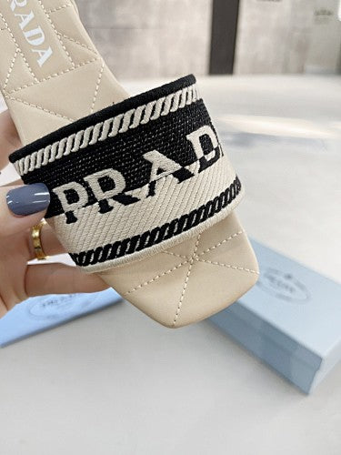 Prada Logo Woven Flat Slide Sandals