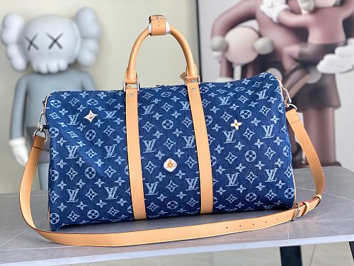 Louis Vuitton Keepall Bandoulière-style travel bag