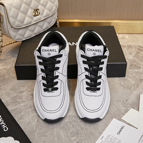 Chanel White & Black CC Logo Low-Top Sneakers