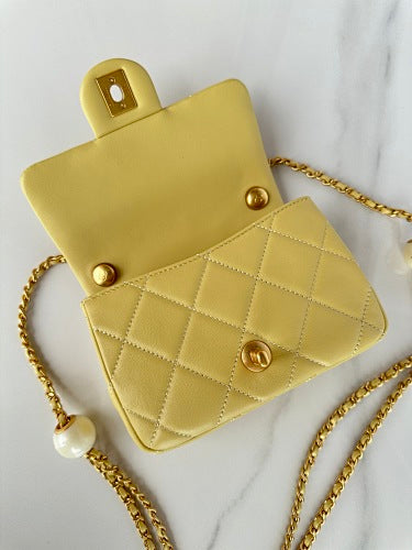 Chanel Yellow Quilted Flap Bag with Pearl-Embellished Chain Strap
