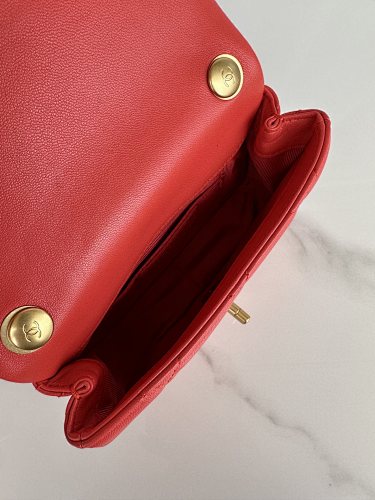 Chanel Red Quilted Flap Bag with Pearl-Embellished Chain Strap.