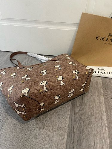 Coach x Peanuts Snoopy City Tote in Signature Canvas