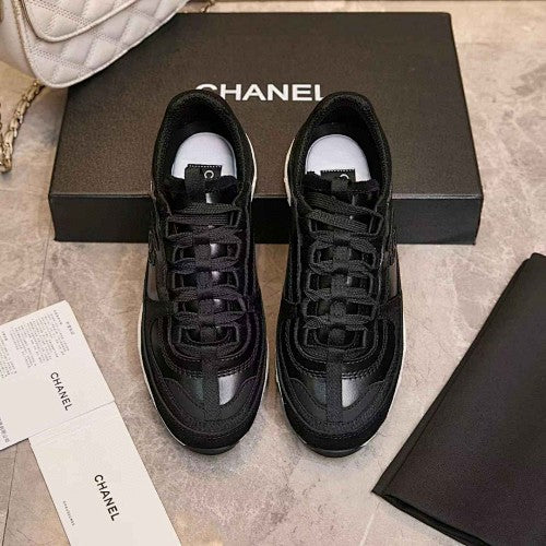 Chanel CC Black & White Low-Top Runner Sneakers