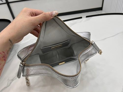 Chanel Silver Metallic Quilted Star-Shaped Chain Bag.