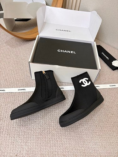 Chanel CC Logo Sock Ankle Boots in Black