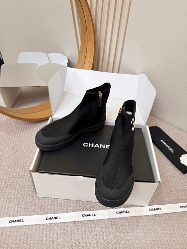 Chanel CC Logo Sock Ankle Boots in Black
