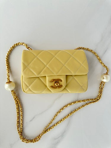 Chanel Yellow Quilted Flap Bag with Pearl-Embellished Chain Strap