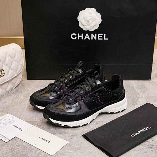 Chanel CC Black & White Low-Top Runner Sneakers
