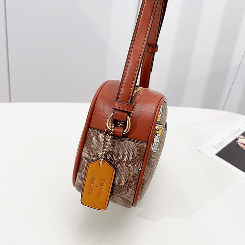 Coach x Peanuts Snoopy Signature Camera Bag