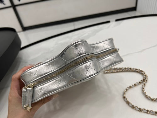 Chanel Silver Metallic Quilted Star-Shaped Chain Bag.