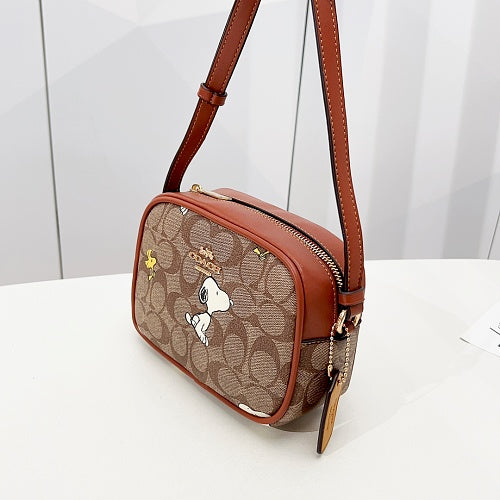 Coach x Peanuts Snoopy Signature Camera Bag