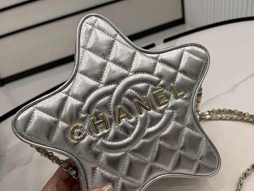 Chanel Silver Metallic Quilted Star-Shaped Chain Bag.
