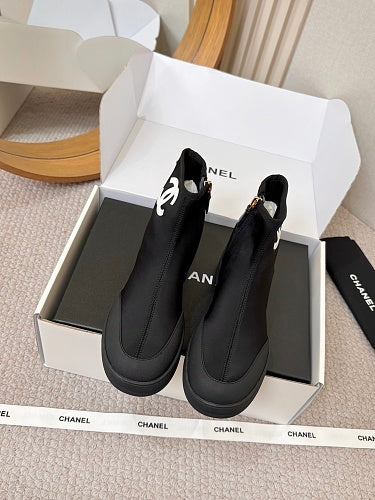 Chanel CC Logo Sock Ankle Boots in Black