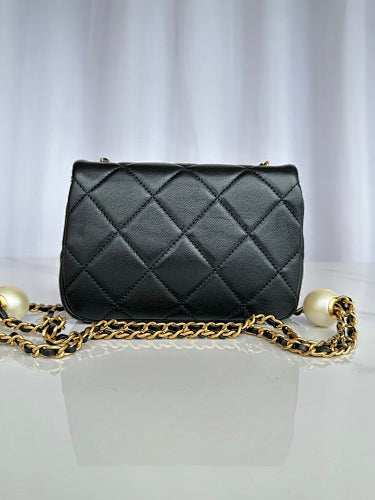 Chanel Black Quilted Flap Bag with Pearl-Embellished Chain Strap