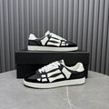 Louis Vuitton black-and-white LV Monogram low-top sneakers