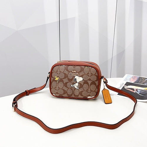 Coach x Peanuts Snoopy Signature Camera Bag