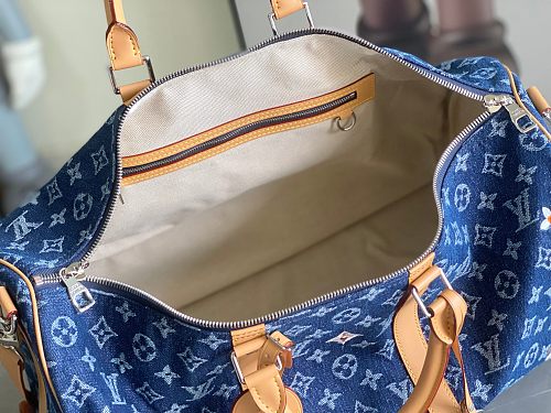 Louis Vuitton Keepall Bandoulière-style travel bag