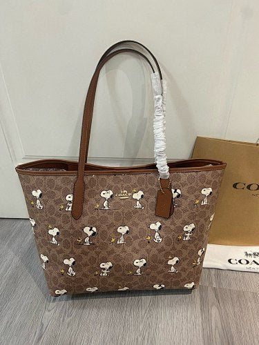 Coach x Peanuts Snoopy City Tote in Signature Canvas
