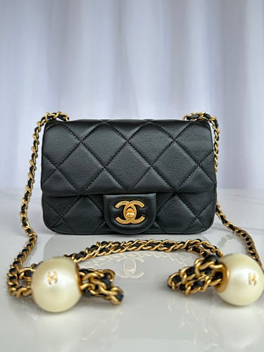 Chanel Black Quilted Flap Bag with Pearl-Embellished Chain Strap