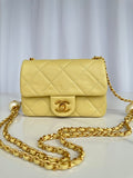 Chanel Yellow Quilted Flap Bag with Pearl-Embellished Chain Strap
