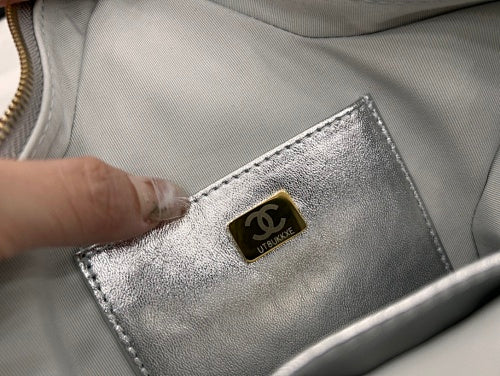 Chanel Silver Metallic Quilted Star-Shaped Chain Bag.
