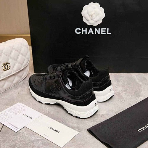 Chanel CC Black & White Low-Top Runner Sneakers