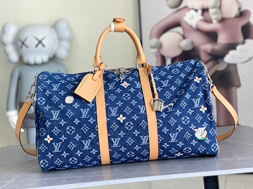 Louis Vuitton Keepall Bandoulière-style travel bag
